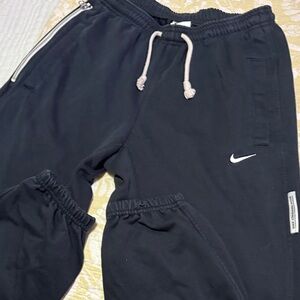 Nike men’s Dark Joggers with White Accents